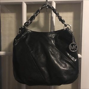 - Michael Kors Leather Handbag